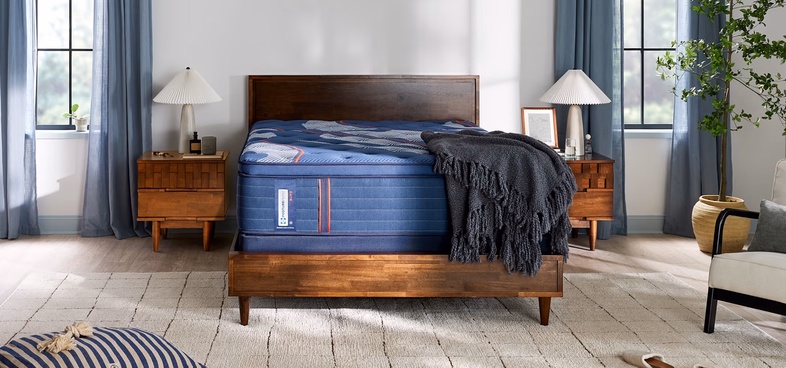 Sealy Posturepedic Elite mattress in a bright bedroom.